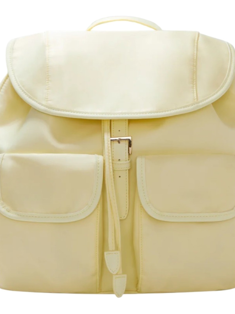Year of Ours nylon backpack features a distinctive pastel butter yellow color